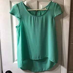 High low turquoise teal cap sleeve top
